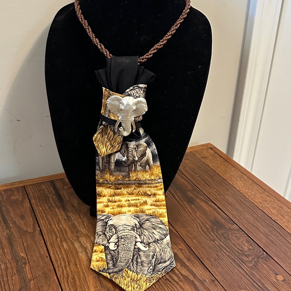 Endangered species Elephant Silk Tie, Elephant head brooch necklace.